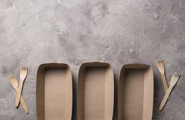 How can UK sports teams effectively implement eco-friendly practices?