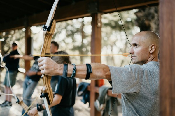 What are the effective methods for improving accuracy in archery?